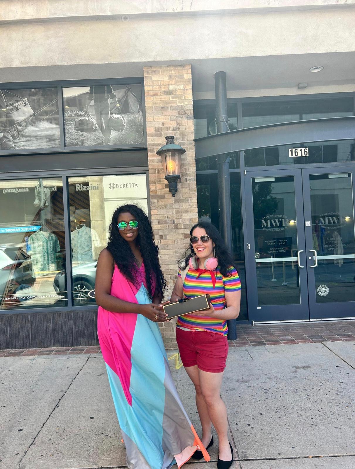 Bloom Box celebration with community members in vibrant setting